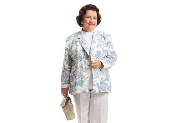 istock Elderly lady wearing vintage clothes and posing 1299768275