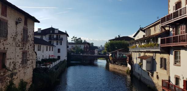 istock A canal view in a French village. 1299771005