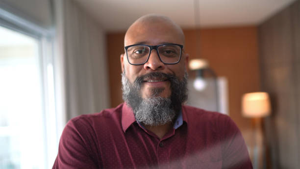istock Portrait of a mature man at home 1299778009
