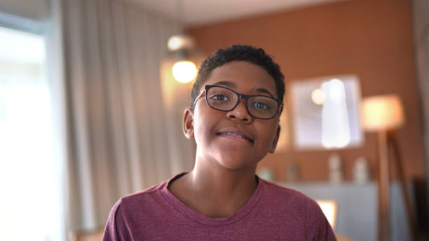 istock Portrait of a boy at home 1299778630