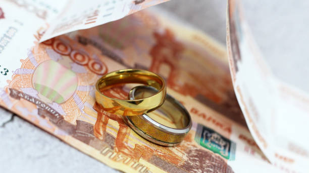 istock Two wedding rings and russian money 1299780418