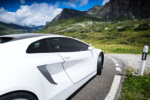 generic white sportscar on a mountain road,  3D, car of my own design.