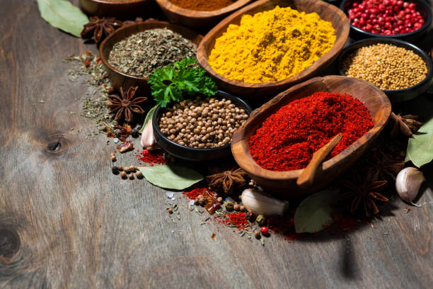 istock assortment of various spices and herbs on a wooden table 1299782218