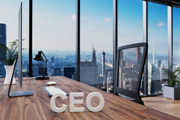 istock ceo; office chair in front of modern workspace with computer and skyline view; company concept; 3D Illustration 1299783728