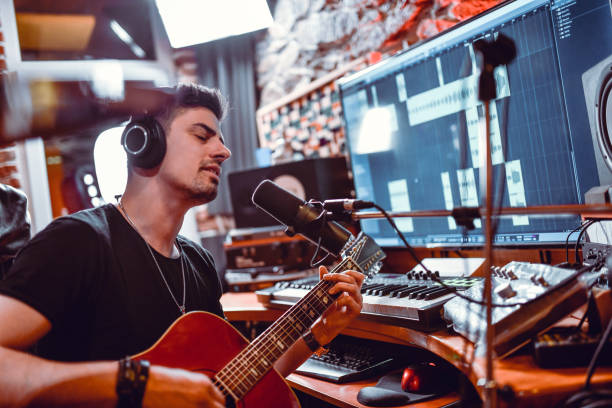 istock Male Artist Focused On His Work In Studio 1299785671