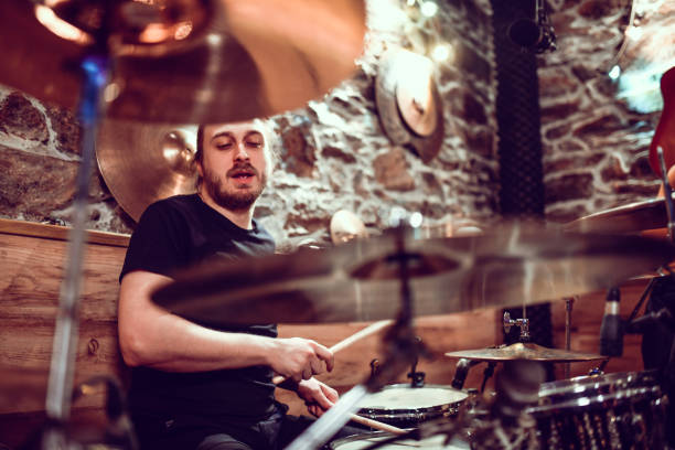 istock Focused Drummer Recording New Song In Studio 1299786134