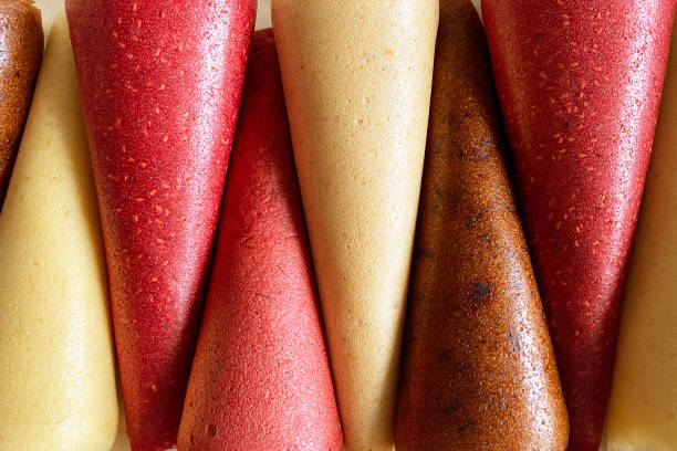 Fruit leather cones close up view. No sugar fruit leather cones. Healthy food. Apples strawberries, oranges close-up, top view.