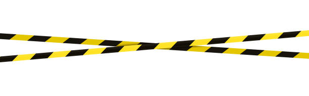 istock Crossed barrier tapes. Black and yellow barricade tape. Construction border. Accident or crime scene dividing line. 1299793076