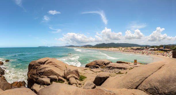 Brazilian Summer time Typical day on the beaches of Praia do Rosa, Florianopolis, Brazil. joaquina beach in florianopolis santa catarina brazil stock pictures, royalty-free photos & images