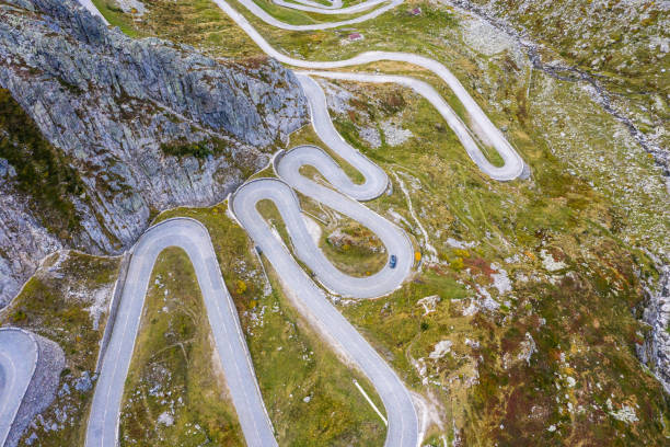 Drone view of the old Gotthard pass Aerial view of winding road at the Tremola road, Ticino, Switzerland gotthard pass stock pictures, royalty-free photos & images