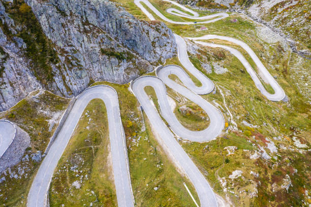 Drone view of the old Gotthard pass Aerial view of winding road at the Tremola road, Ticino, Switzerland gotthard pass stock pictures, royalty-free photos & images