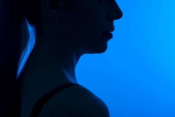 istock Detail of profile in a woman's sinhouette. 1299796375