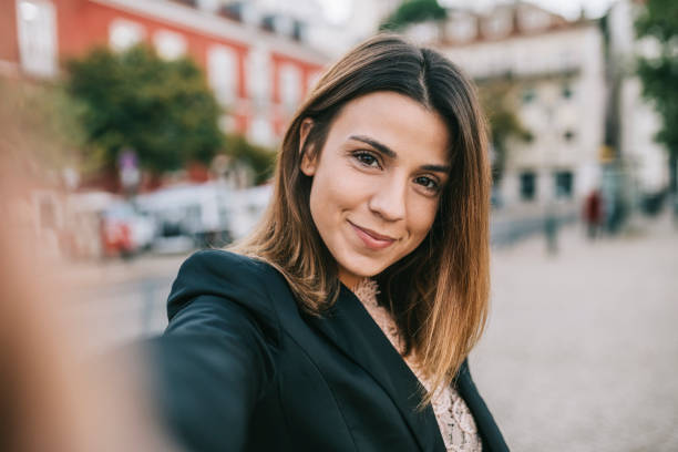 istock Businesswoman taking a selfie 1299800255