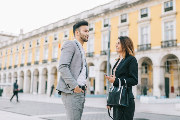 istock Business people communicating in the city 1299800283
