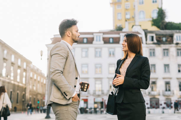 istock Coworkers having a chat in the city 1299800309