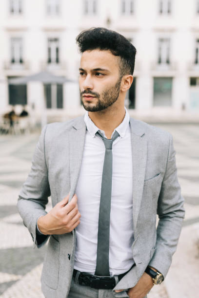 istock Serious businessman in the city 1299800354