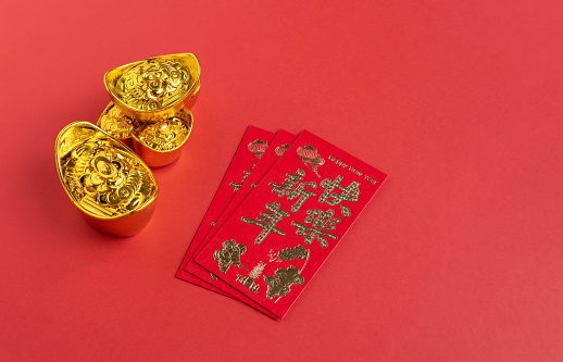 Red Envelope also known as Angpow is a gift during Chinese New Year, Golden ingot represent prosperity.