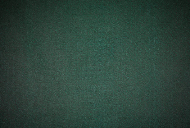 istock abstract festive dark fabric green background 1299805128