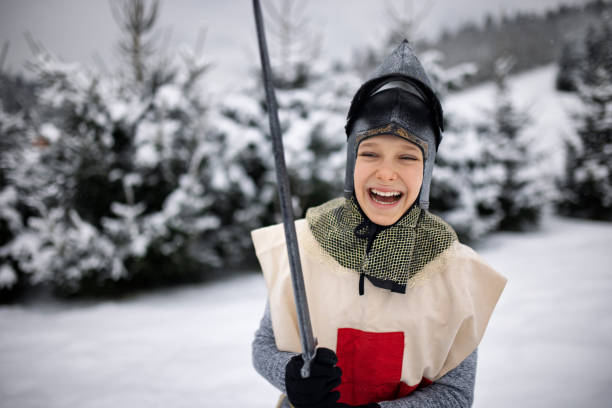 istock Little knights playing on a winter day 1299805793