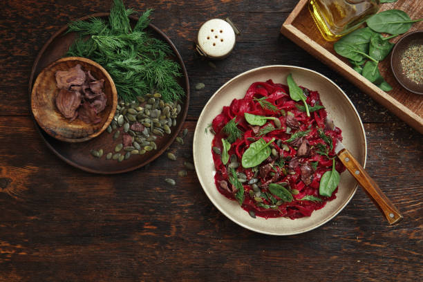 istock Vegan Gluten-Free Pasta with Creamy Beet Sauce 1299806939