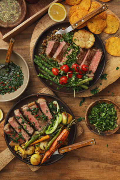 istock Grilled Steak with Quinoa and Lentil Salad and Roasted Root Vegetables. 1299808037