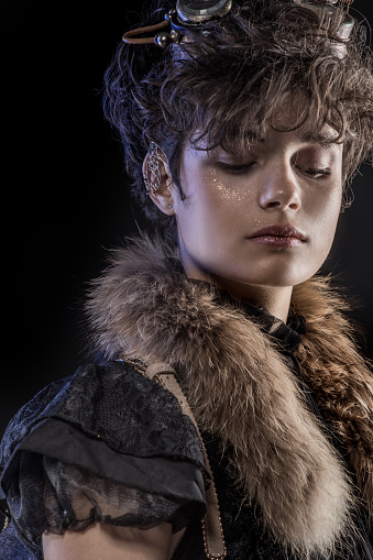 Headshot of a Steampunk female in a studio shot