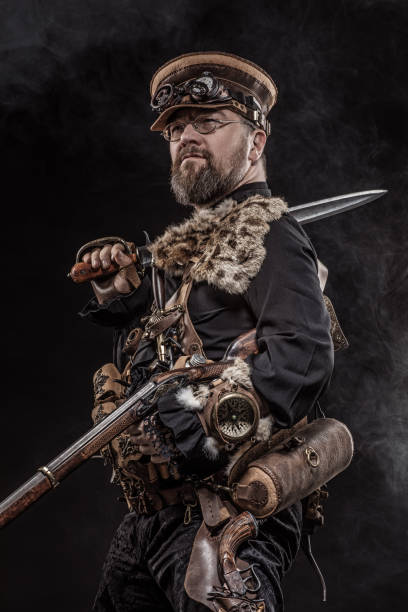 istock Steampunk male military character in a studio shot 1299809189