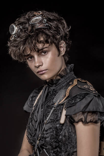 istock Headshot of a Steampunk female in a studio shot 1299809211