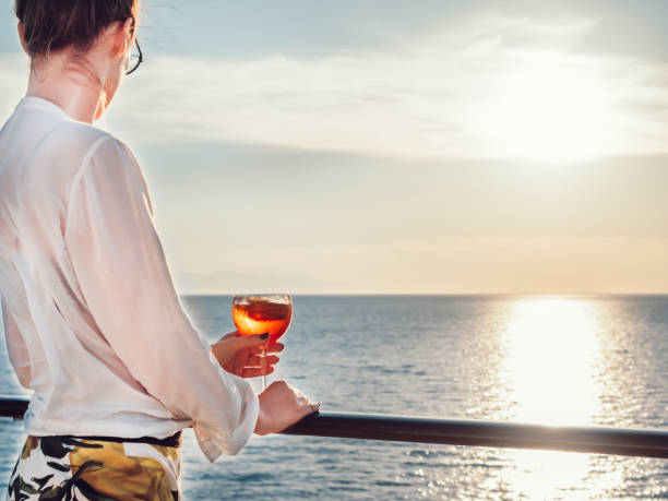 istock Cute woman and beautiful glass with a drink 1299809426
