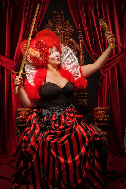 istock Queen of Hearts type character on the throne 1299809822