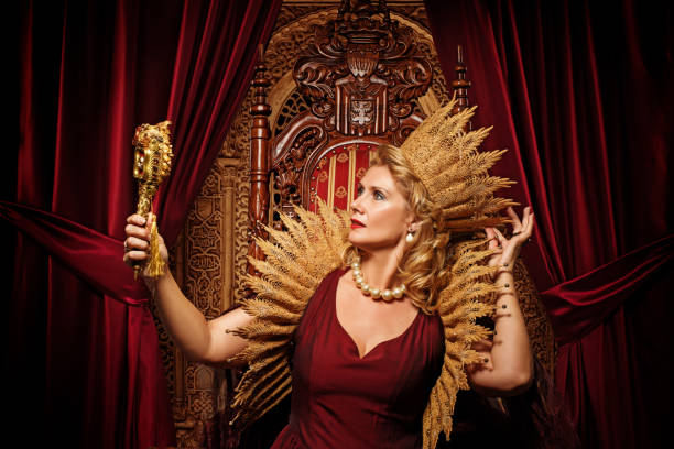 istock Historical Queen character on the throne 1299810142