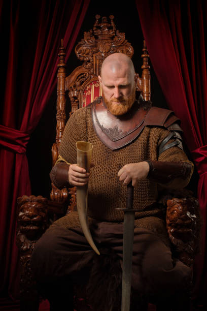 istock Scottish King on the throne in studio shoot 1299810737