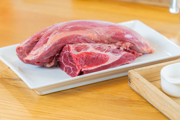 istock Raw pork on dish and ingredient. 1299814243
