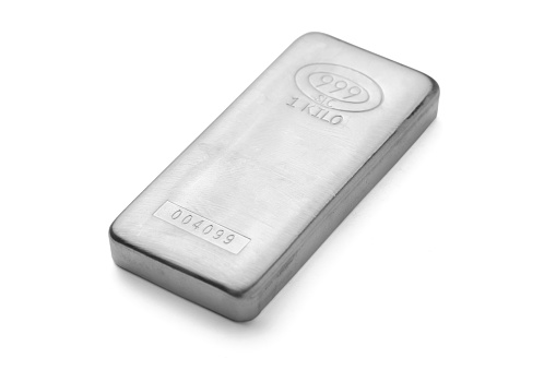 A silver buillion 1 kilo bar isolated on white background with clipping path.