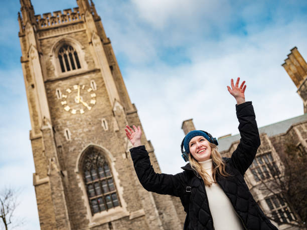 istock Female university student with headphones 1299817488
