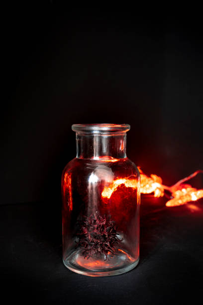 istock Metaphorical image of beating a virus with dark background and red lights 1299822048