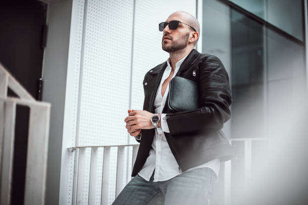 istock Handsome modern man in city 1299822797