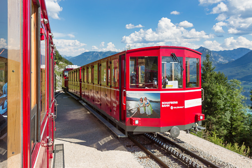 Sankt Wolfgang, Austria - Juli 19, 2017: Two cogwheel trains passing each other near top Schafberg of Austrian Sankt Wolfgang am Wolfgangsee