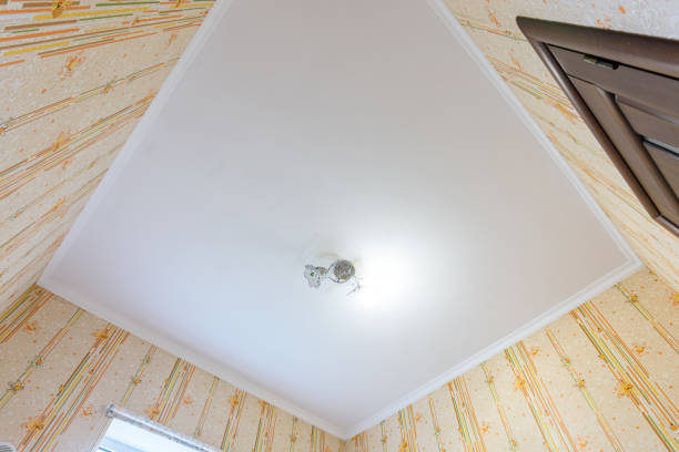 istock Plastered and white painted ceiling in the children's room 1299826564