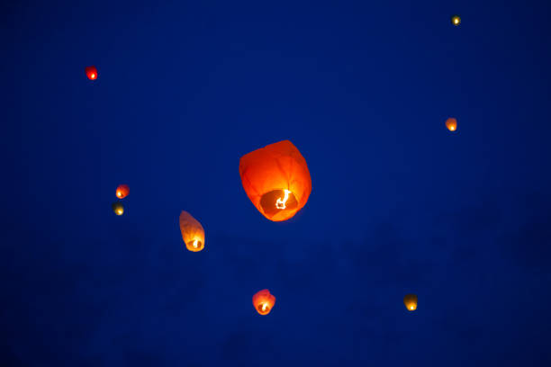 istock The Chinese lantern flies up highly in the sky. 1299827528