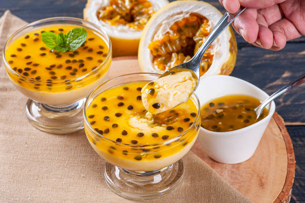 istock Passion fruit mousse. Refreshing dessert with fresh passion fruit topping 1299828029