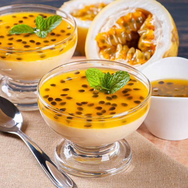 istock Passion fruit mousse. Refreshing dessert with fresh passion fruit topping 1299828045