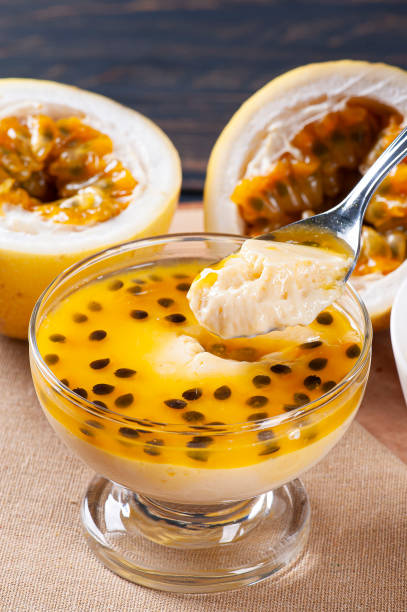 istock Passion fruit mousse. Refreshing dessert with fresh passion fruit topping 1299828061