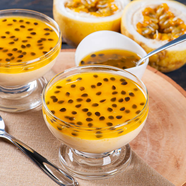 istock Passion fruit mousse. Refreshing dessert with fresh passion fruit topping 1299828063