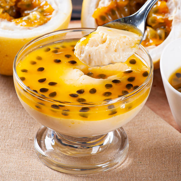 istock Passion fruit mousse. Refreshing dessert with fresh passion fruit topping 1299828119