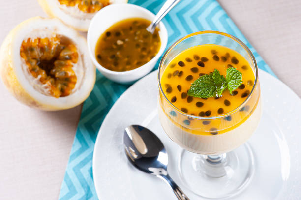 istock Passion fruit mousse. Refreshing dessert with fresh passion fruit topping 1299828436