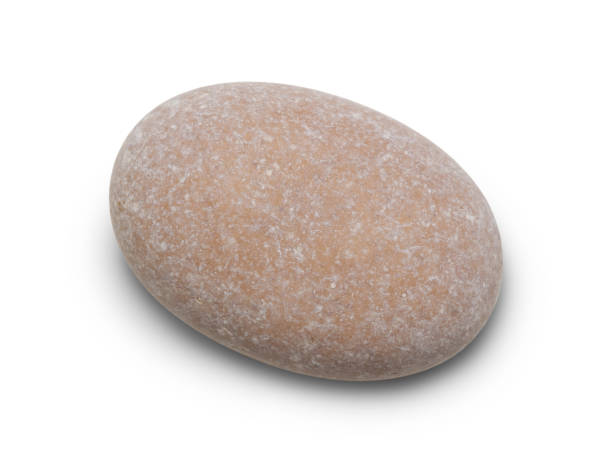 istock Pebble. Smooth red sea stone isolated on white background with shadows, clipping path  for isolation without shadows on white 1299829908