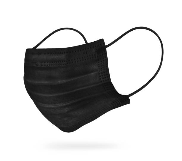 istock Typical black medical mask close up isolated on white background 1299833682
