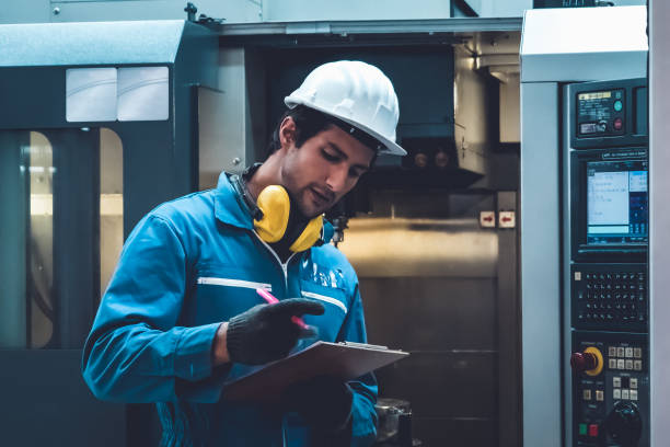 istock Smart factory worker or engineer do machine job in manufacturing workshop 1299836252