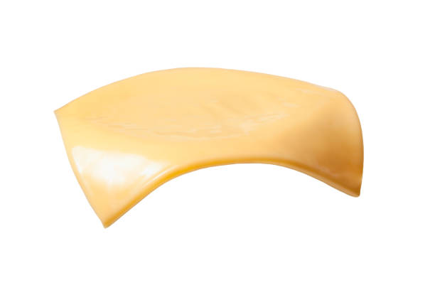 istock Yellow cheese slices isolated on white background 1299838263